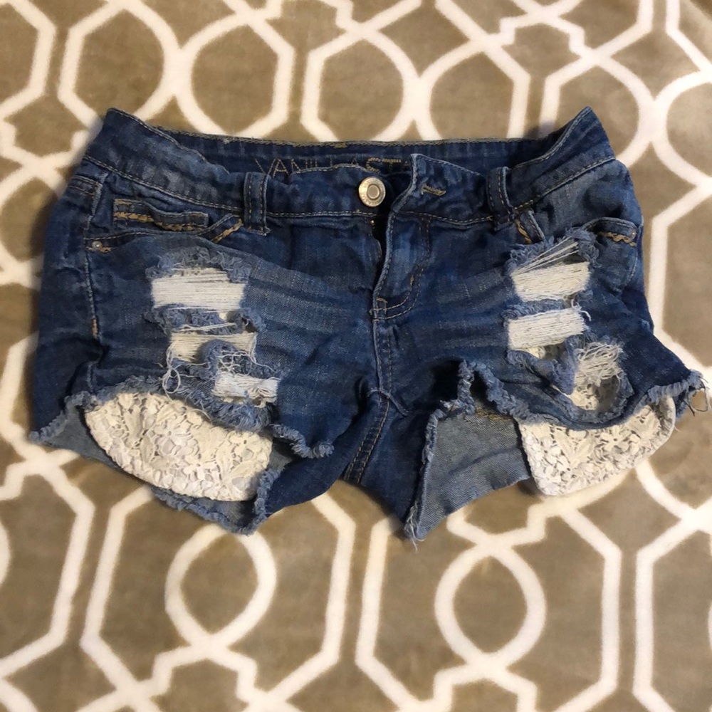Medium dark wash jean shorts.